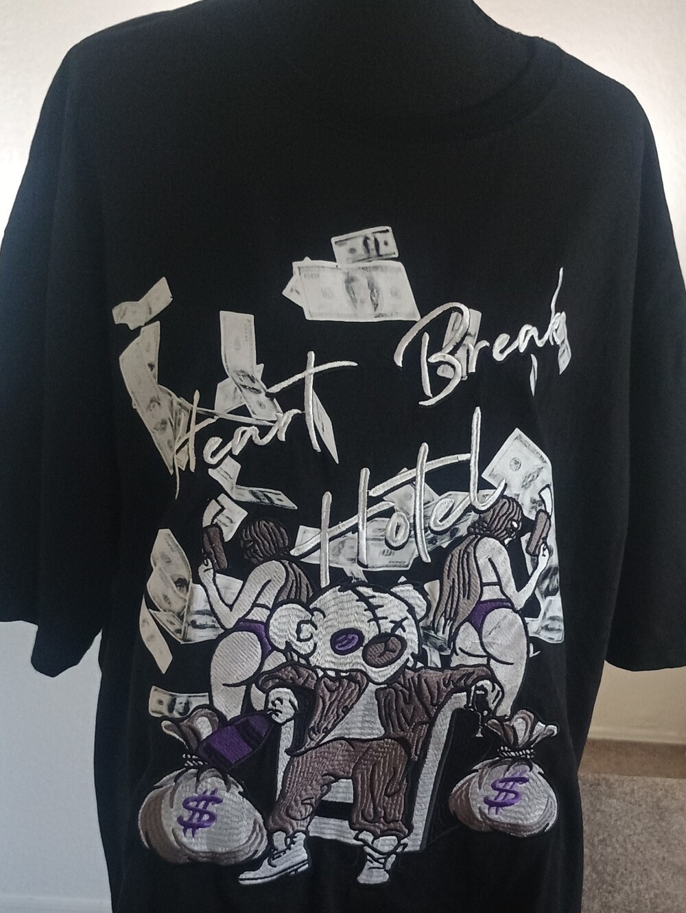 Retro Label Black Graphic Crewneck Tee with Money Bear Illustration
